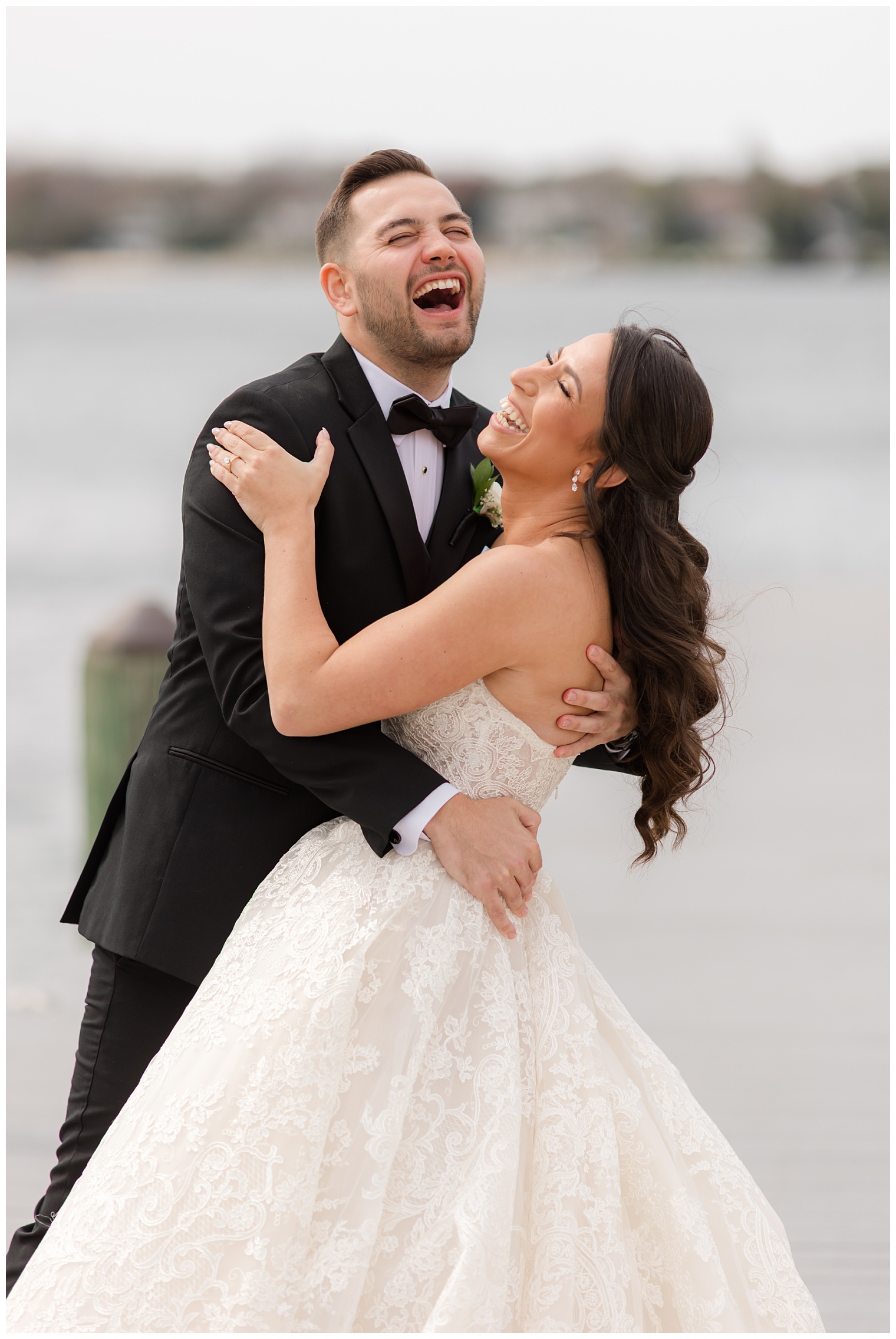 bride and groom laughing