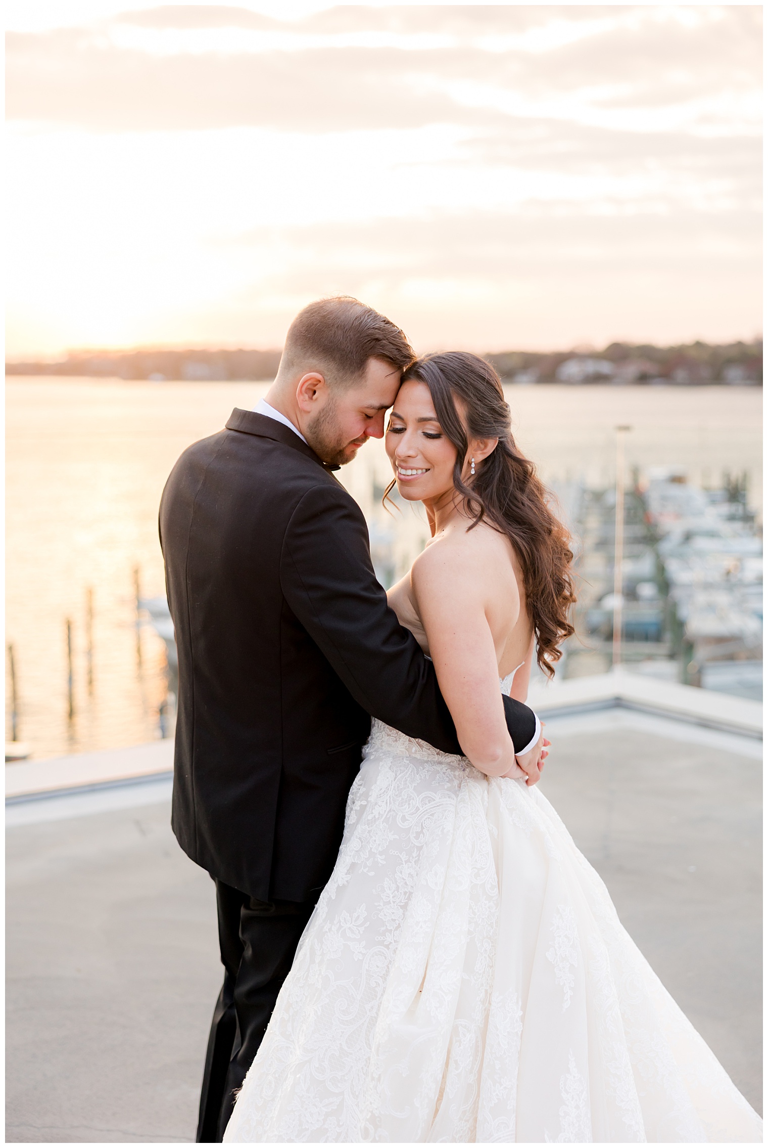 bride and groom with the sunset in the background