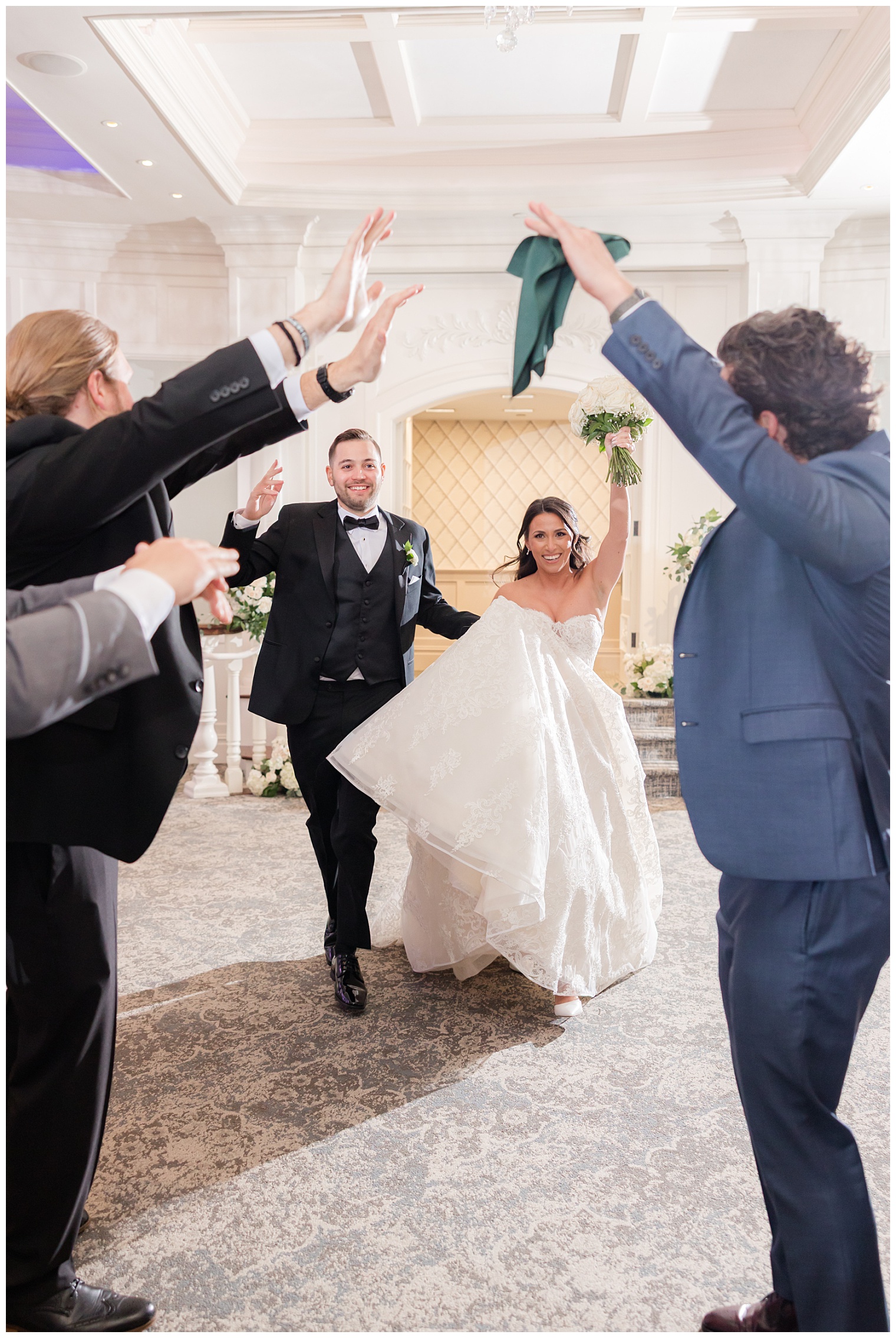 bride and groom entering to the ballroom