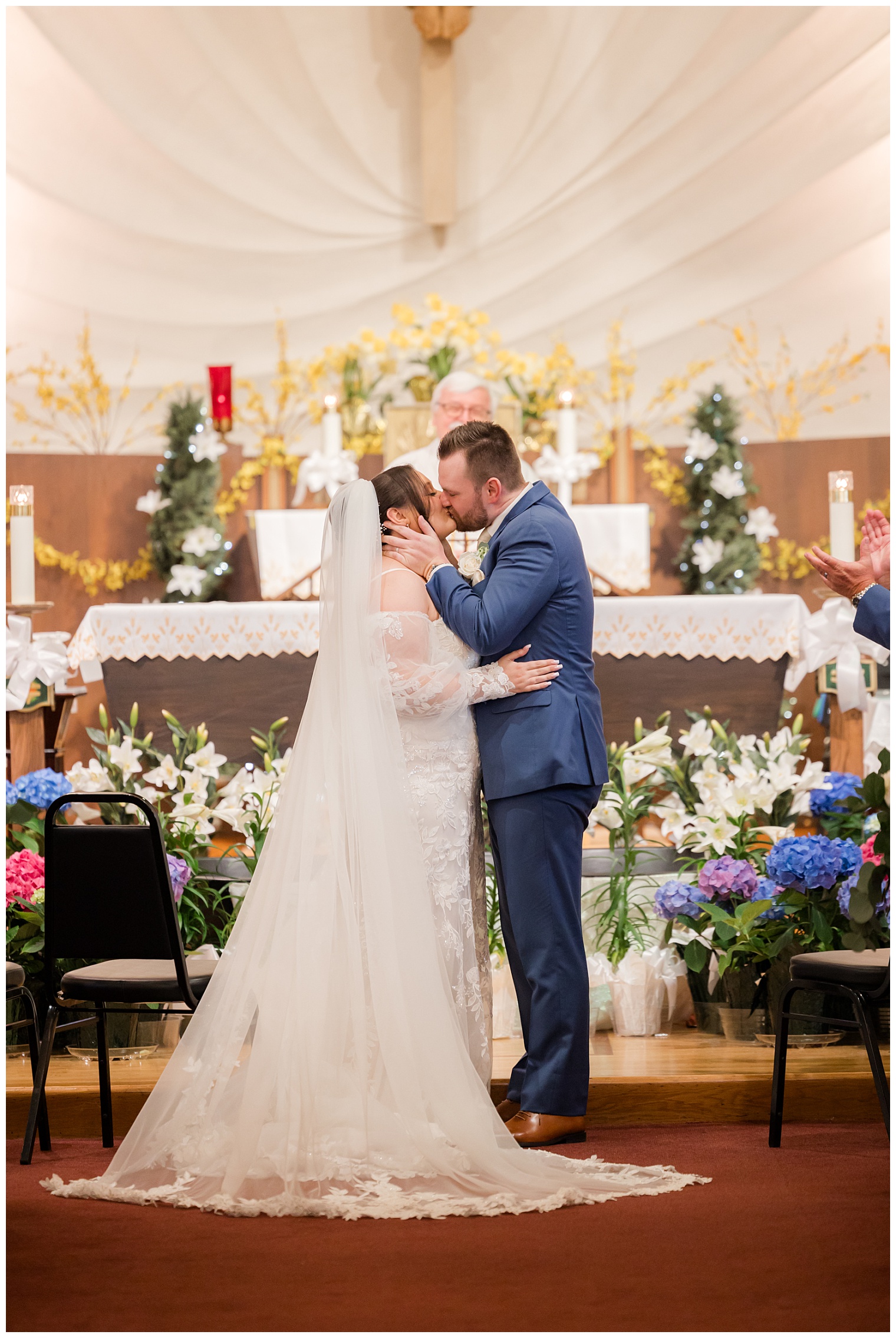 bride and groom kissing