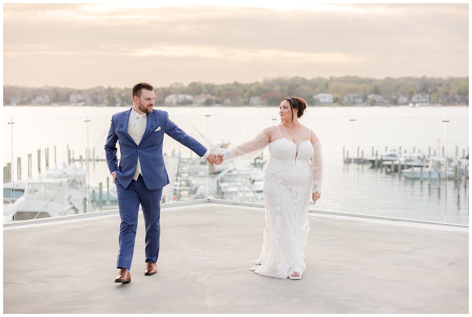 bride and groom holding hands
