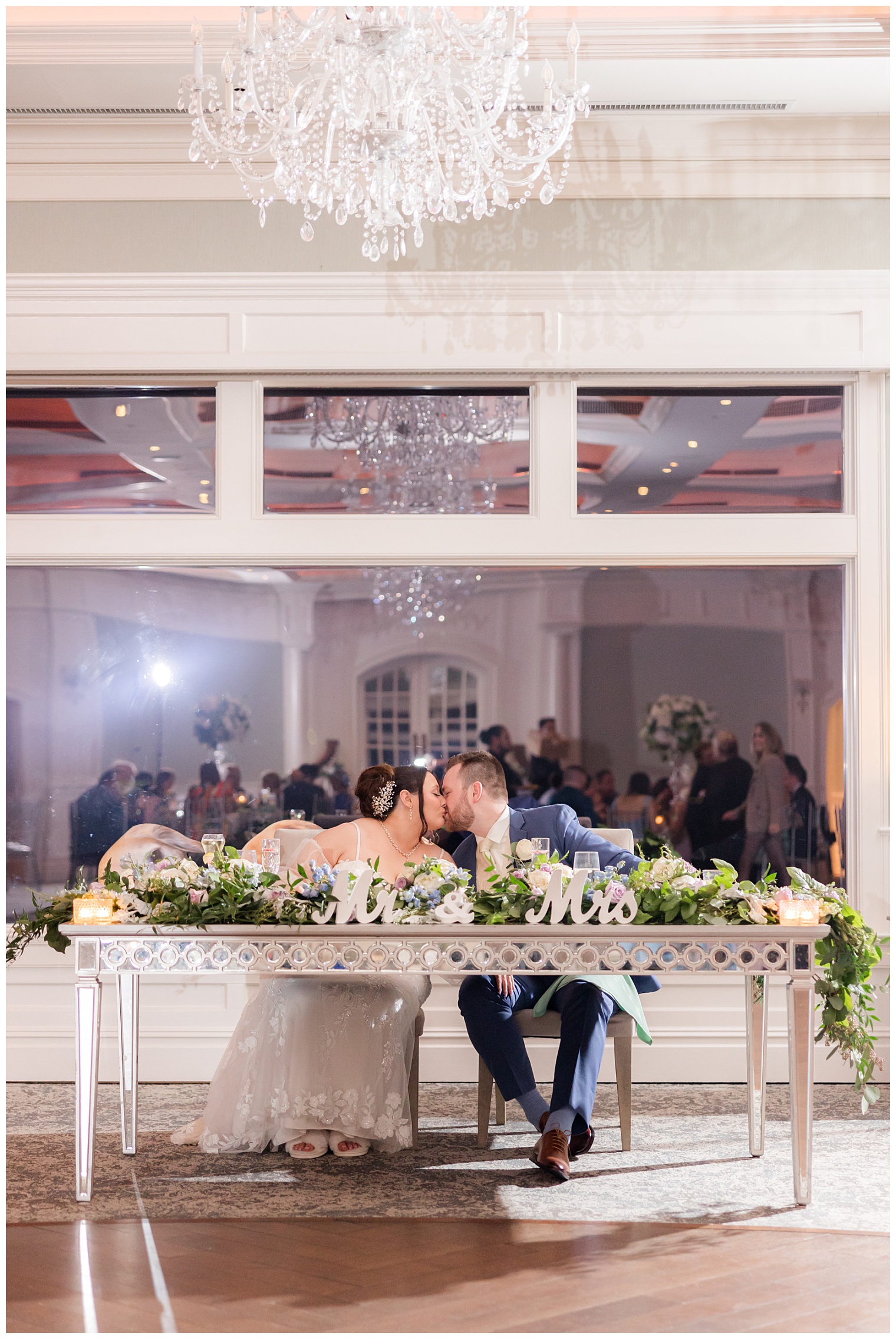 bride and groom at the sweetheart table