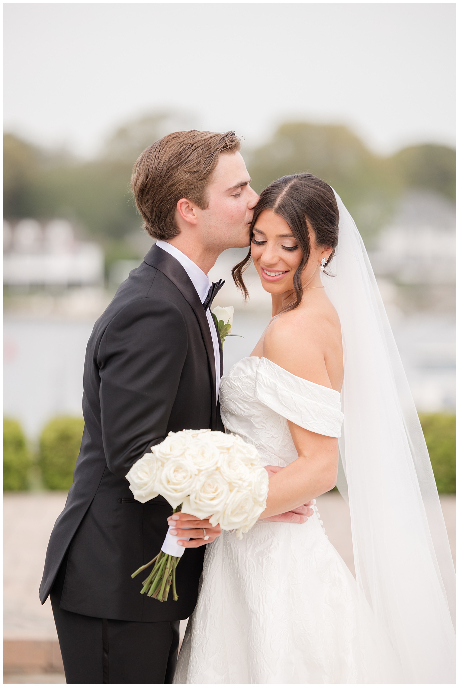 groom kissing the bride