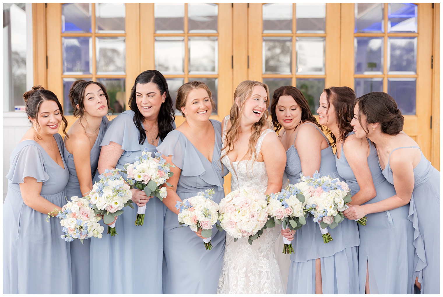 bride with her bridesmaids