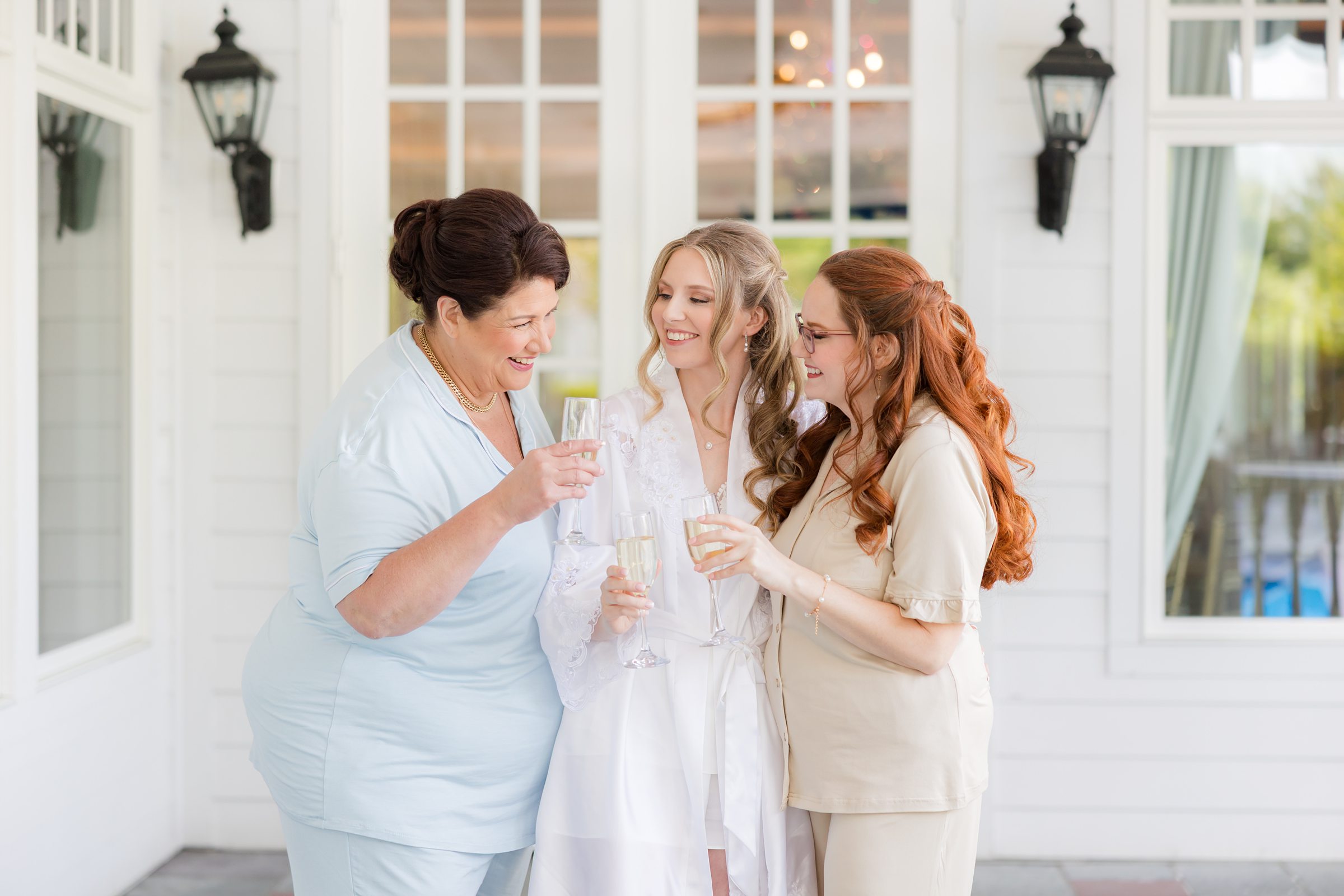 Bride getting ready with mom maid of honor