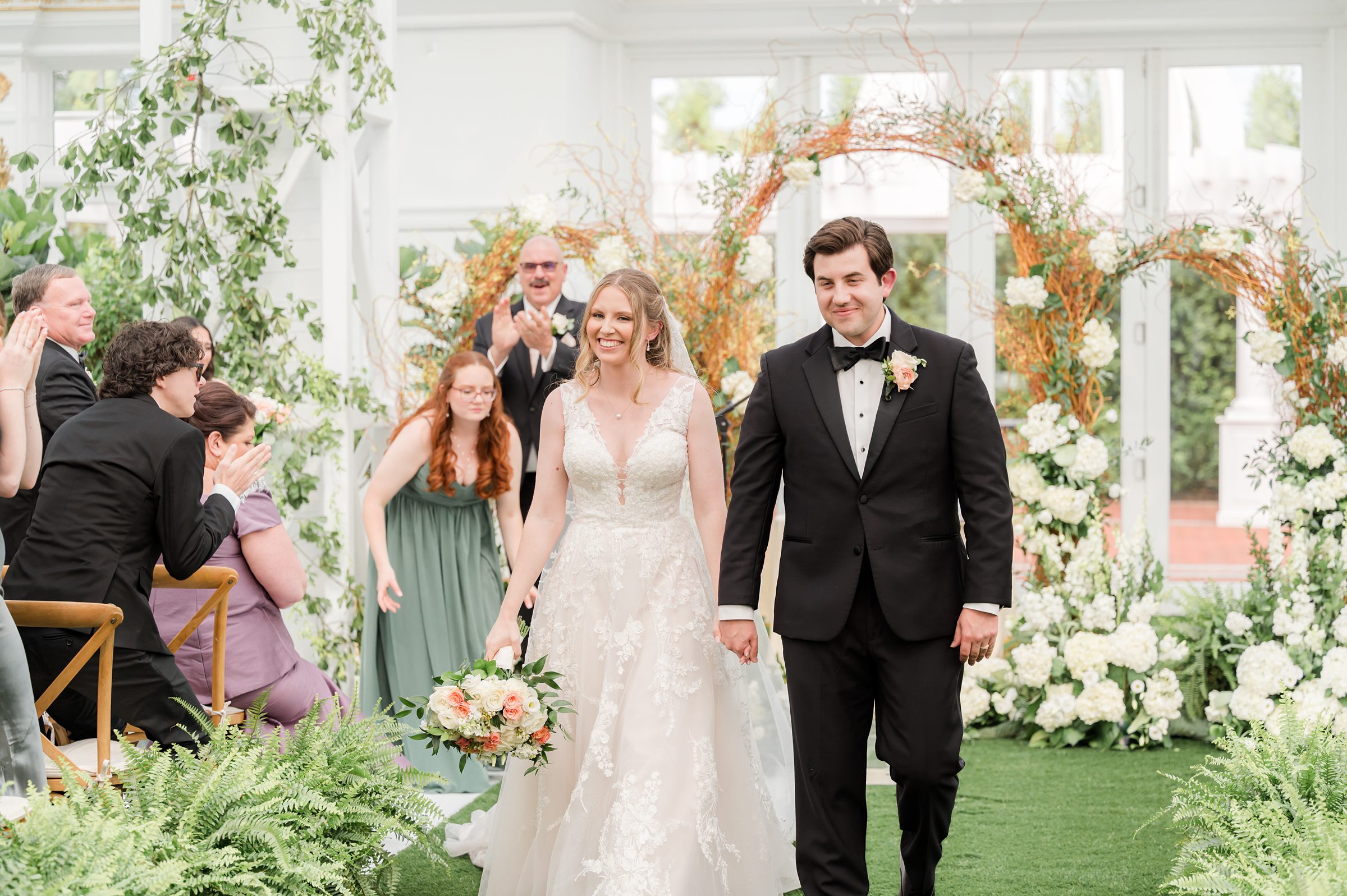 Bride and groom walking down the aisle