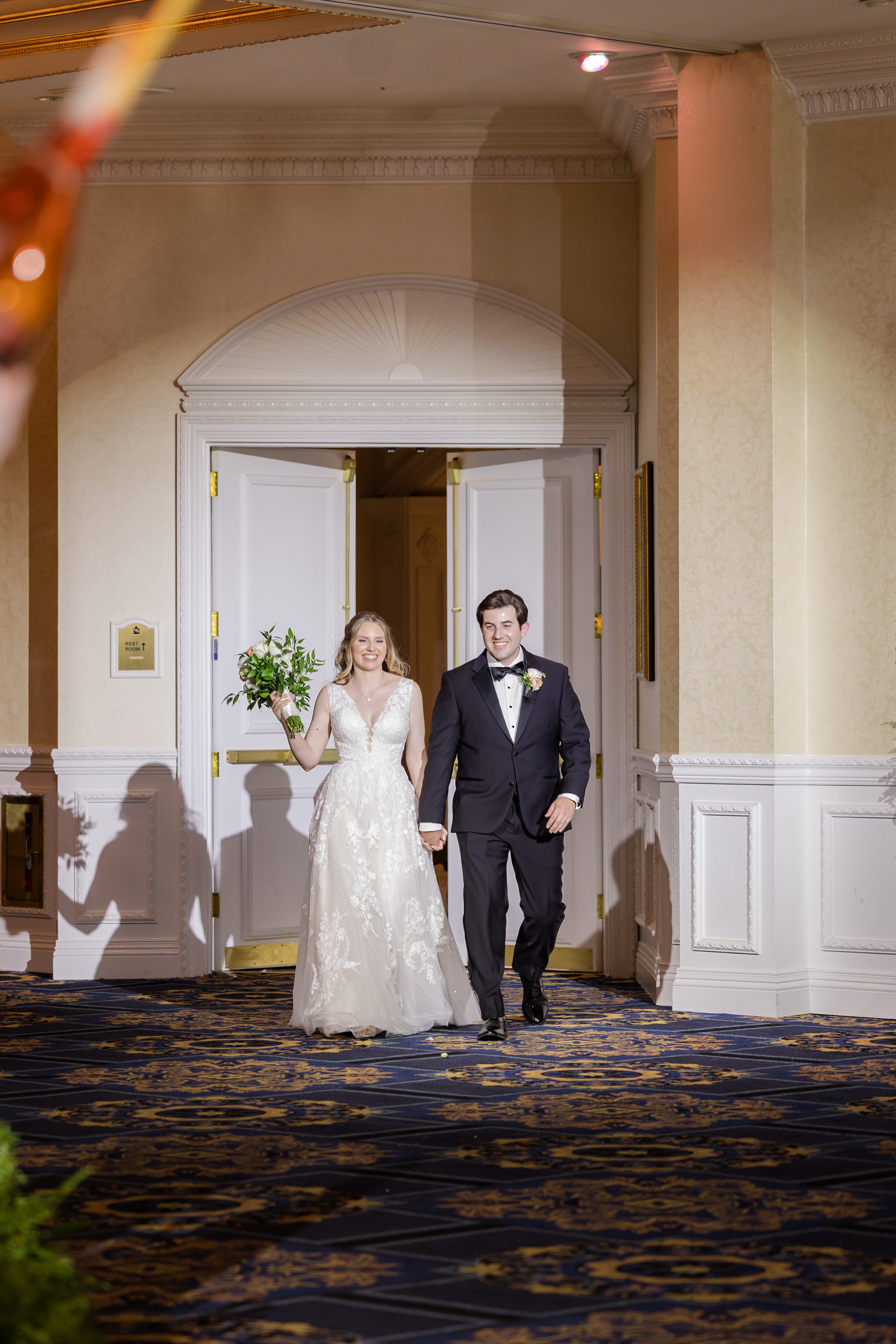 Bride and groom official ballroom entrance at the reception