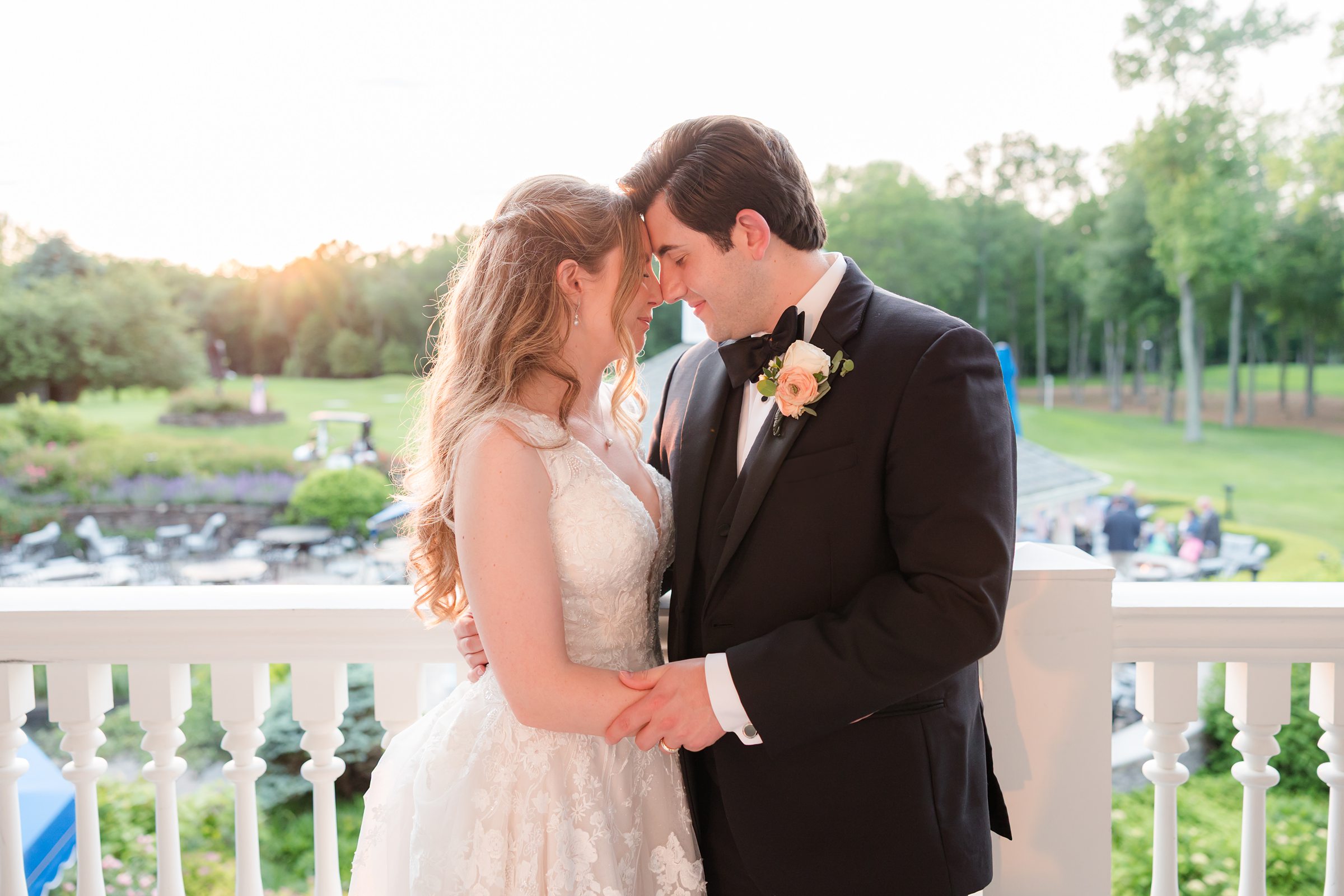 Bride and groom portrait at the terrace during sunset