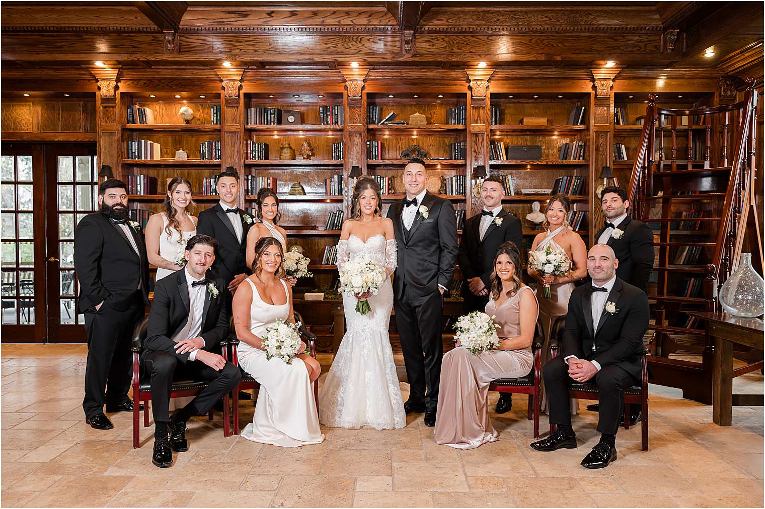 editorial photo of bridal party in the library at Ashford Estate in Allentown NJ
